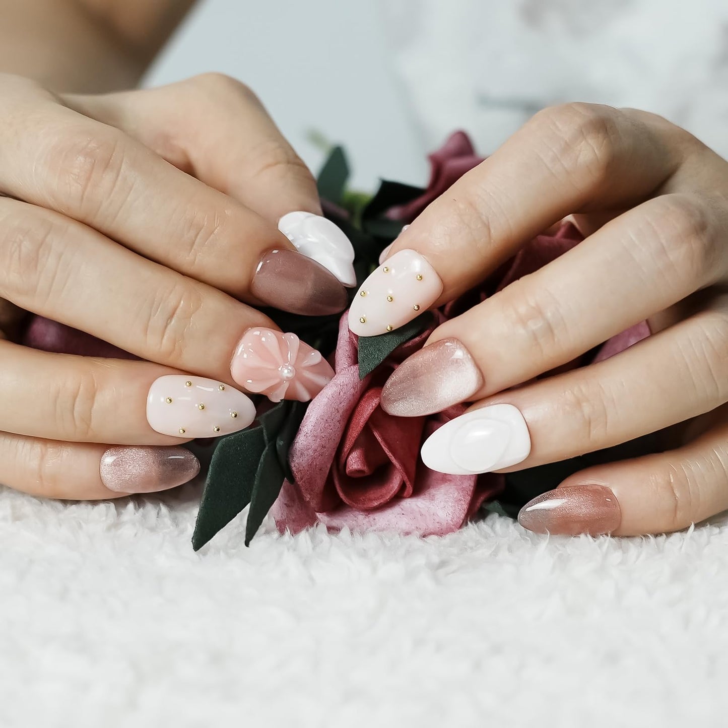 Tesytto Nude Pink Press on Nails Short Almond Cat Eye Fake Nails with 3D Sleek Water Drop Design Glossy Finish Glitter Full Cover Acrylic Nails (Ice Flowers,M)