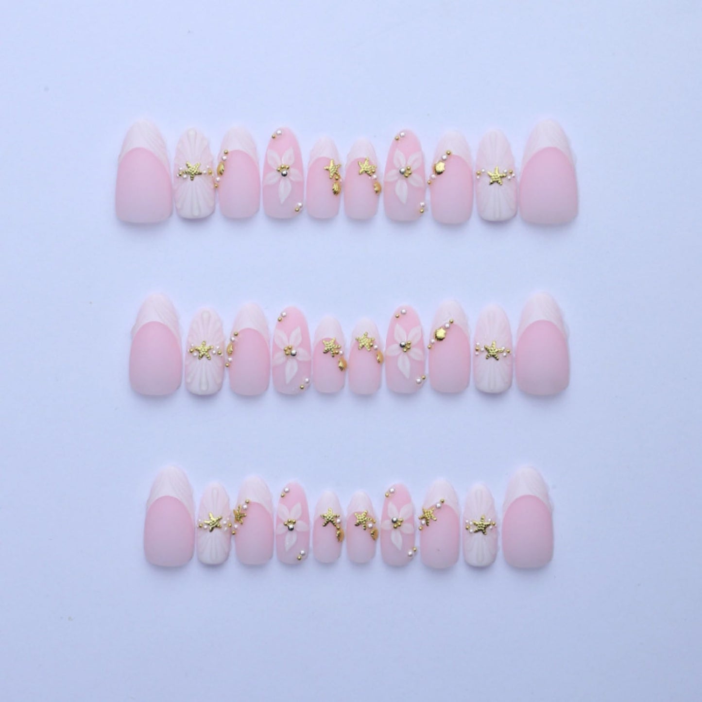 octoswave Press on Nails Medium Almond Fake Nails White French Artificial Nail with Stars and Pearl Charm Stick on Nail for Women 24pcs