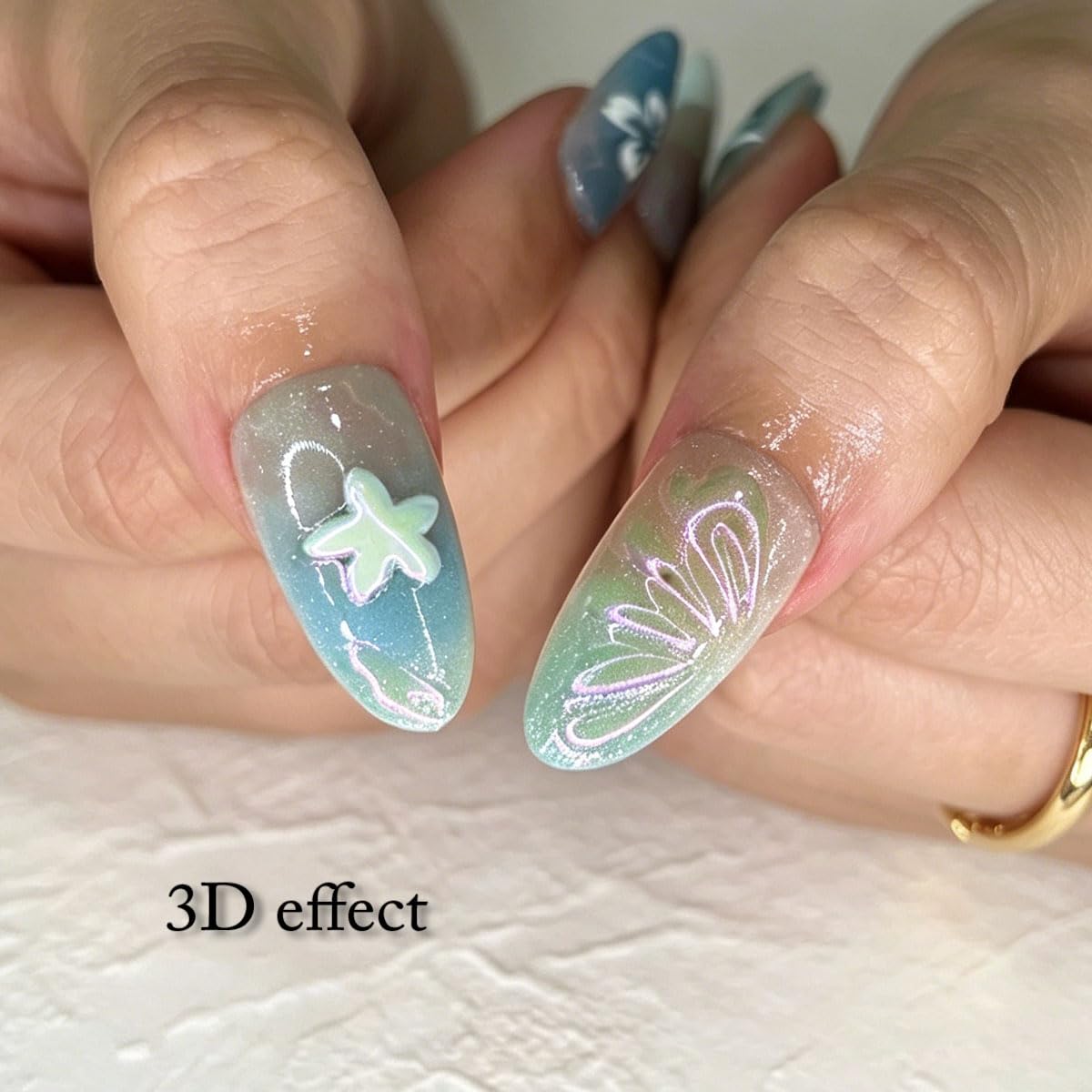 3D Press On Nails Almond Medium Light Blue Fake Nails with French Cat's Eye Embossed Flower&Lines Summer Designs, Acrylic Artificial Nail Press ons False Stick On Nails for Women Girls 30Pcs