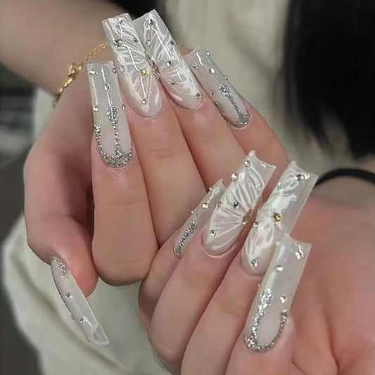 RTKHFZE Long Coffin Press on Nails Cute Acrylic Fake Nails Nude Glitter False Nails with Butterfly Pattern Designs Rhinestone Artificial Nails Full Cover Stick on Nail for Women 24Pcs