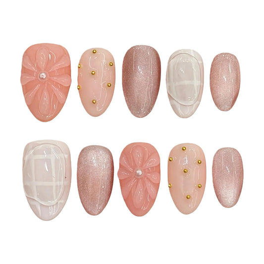 Tesytto Nude Pink Press on Nails Short Almond Cat Eye Fake Nails with 3D Sleek Water Drop Design Glossy Finish Glitter Full Cover Acrylic Nails (Ice Flowers,M)