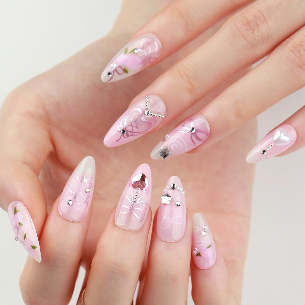 24Pcs Almond Press on Nails Medium Luxury Pink Fake Nails with 3D Heart Pearl Star Rhinestones Gems Designs White Gradient Bow Rose Flower Stick on Nails Full Cover Glue on Nails for Women