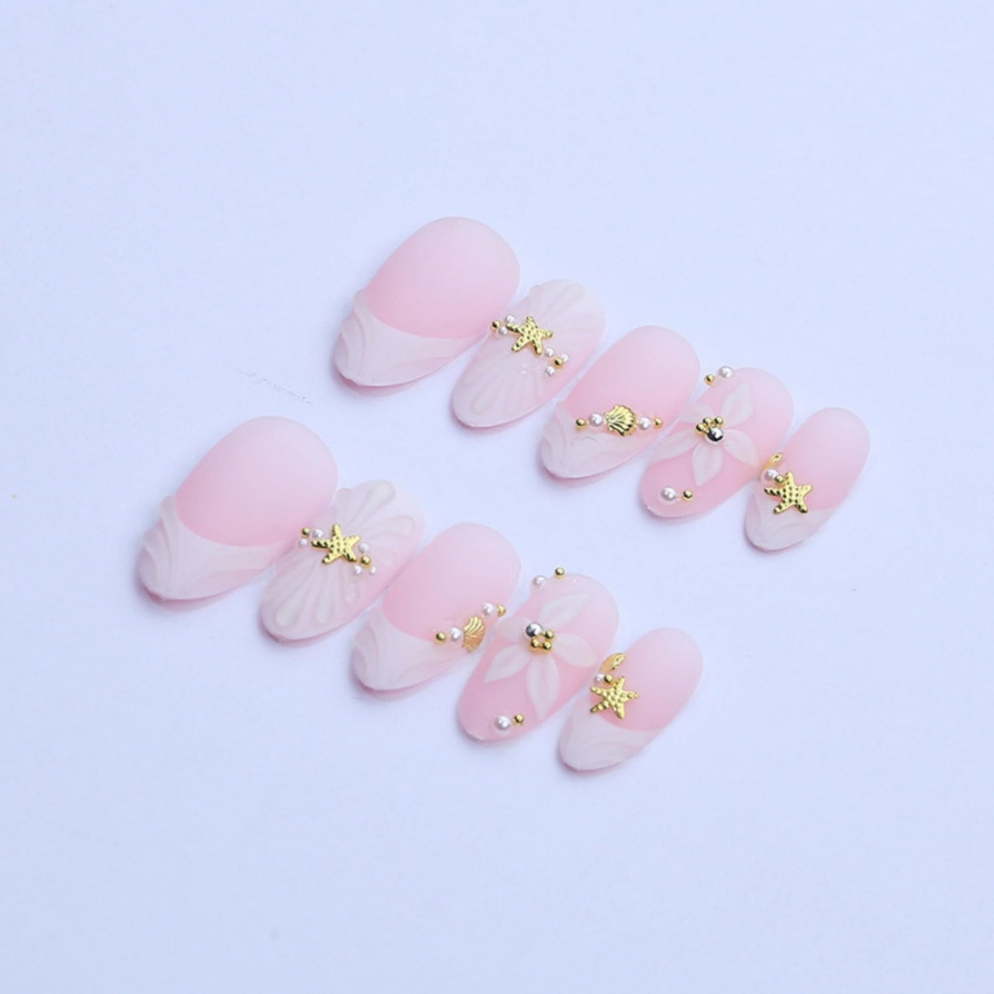 octoswave Press on Nails Medium Almond Fake Nails White French Artificial Nail with Stars and Pearl Charm Stick on Nail for Women 24pcs