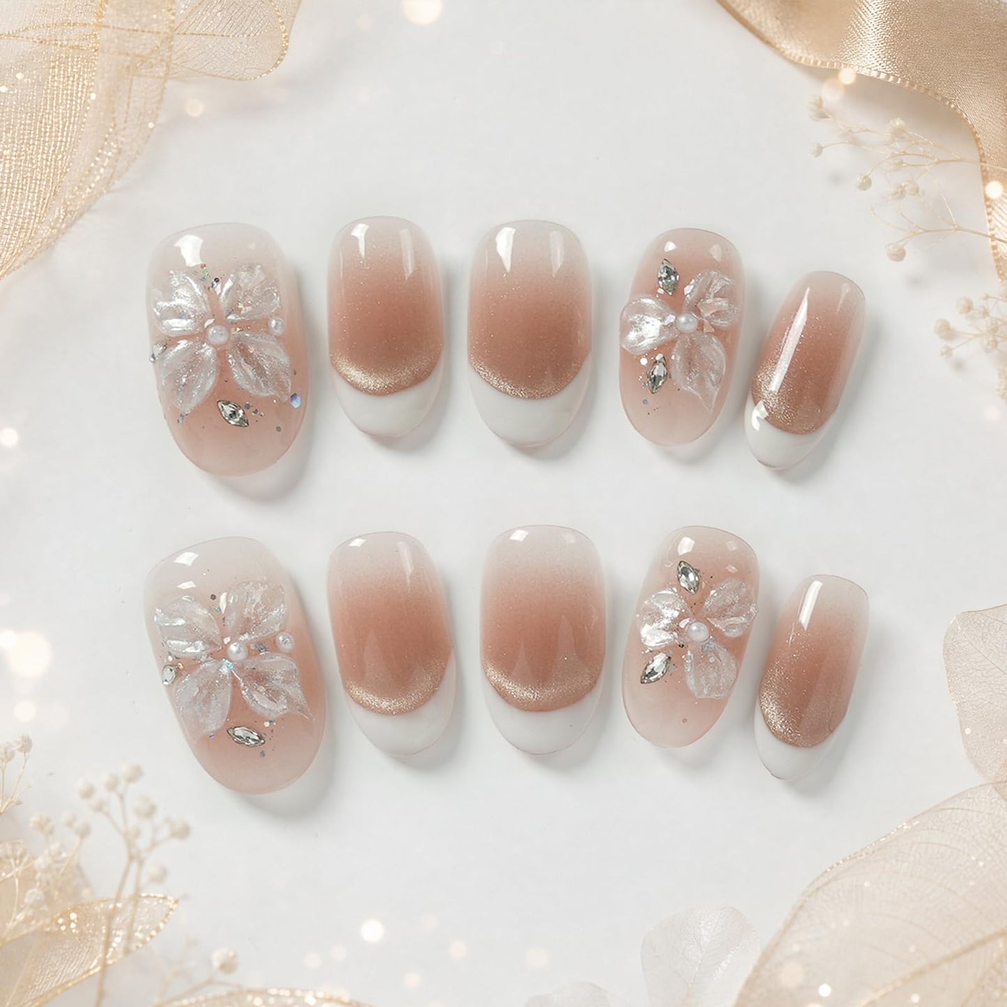 Tesytto Short Oval Press On Nails, Nude Cat Eye Gradient False Nails with White French Tip & 3D Sheer Flower, Reusable Glossy Fake Nails (Gold Shimmer Crystal,M)