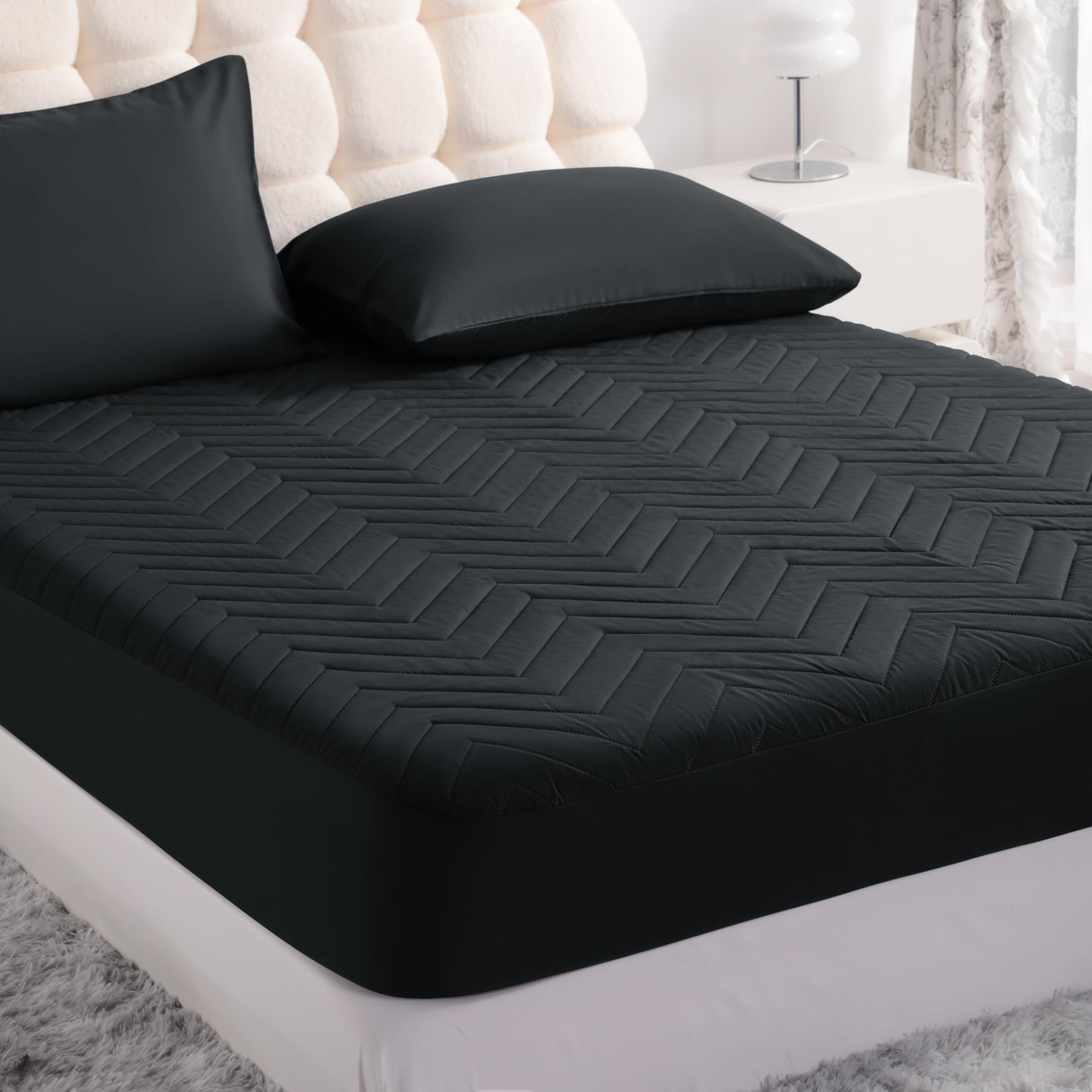 NTBAY Waterproof Mattress Protector, Quilted Twin Fitted Mattress Cover with 15" Deep Pocket- Machine Washable - Soft Mattress Pad Cover, Black