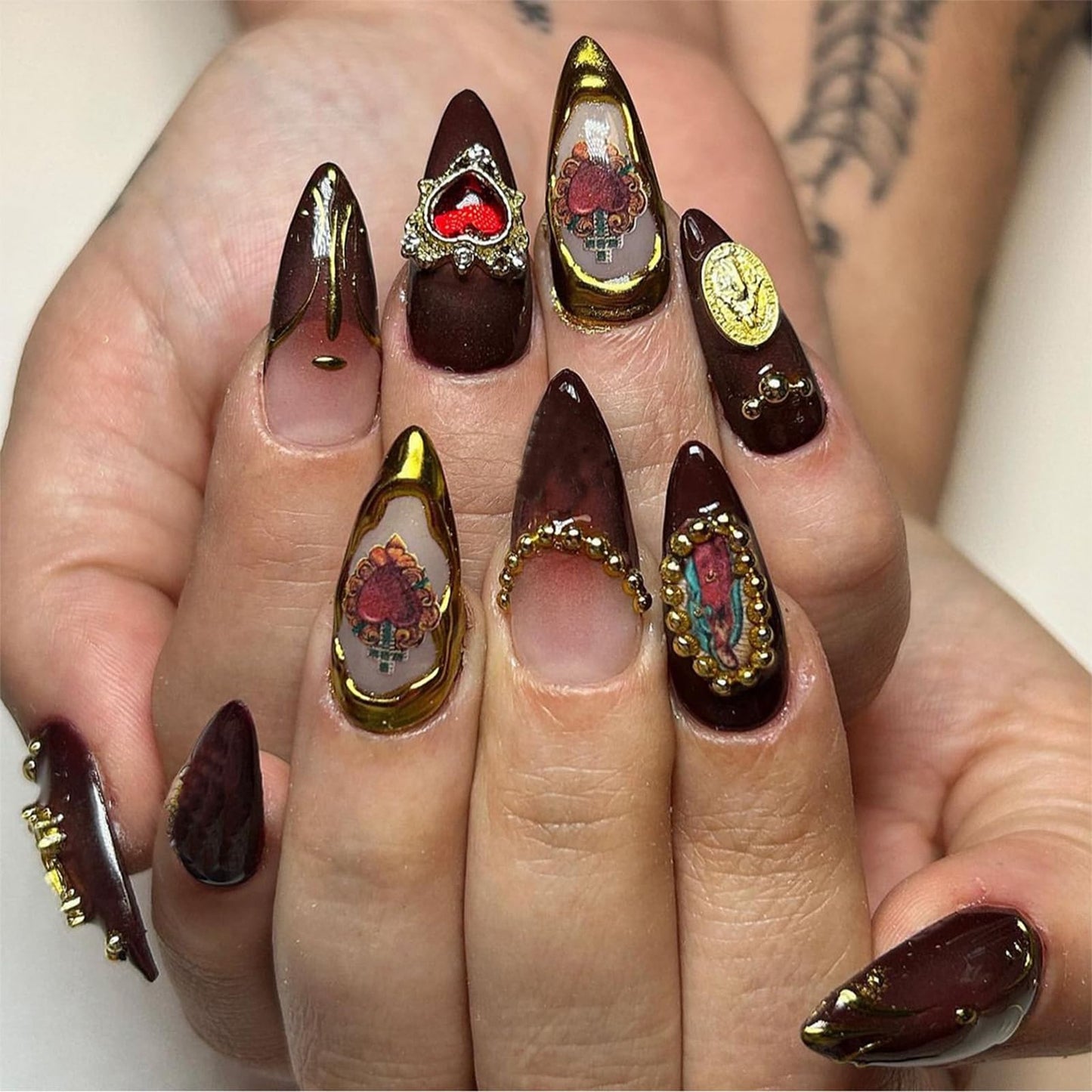 IMSOHOT Almond Press on Nails Medium Brown Fake Nails with Vintage Golden Charms Designs Glossy Glue on Nails Full Cover Gel Acrylic Stiletto Fall False Nails for Women 24Pcs