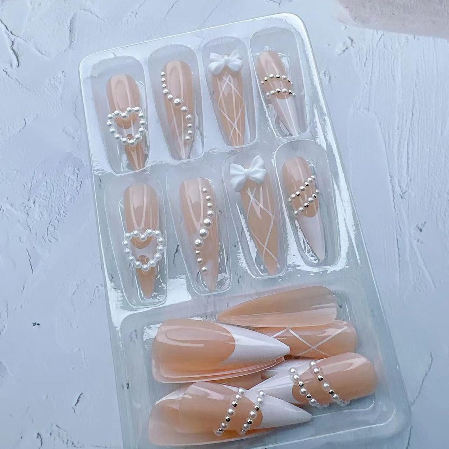 French Tip Press on Nails Long Almond Fake Nails with Heart-Shaped Pearl Bow Charms Acrylic Nails Press ons Cute Design French Nails Press ons Cute Bow Stick on Nails Rhinestones Nails for Women