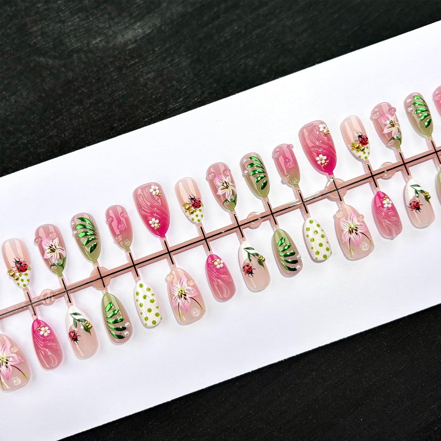 Hand-Painted Lily Press on Nails, Medium Almond Pink Green Fake Nails with Ladybug & Gold Beads Designs, Spring Floral False Nails with Nail Glue Tabs - 30Pcs Nail Kit for Women Manicure