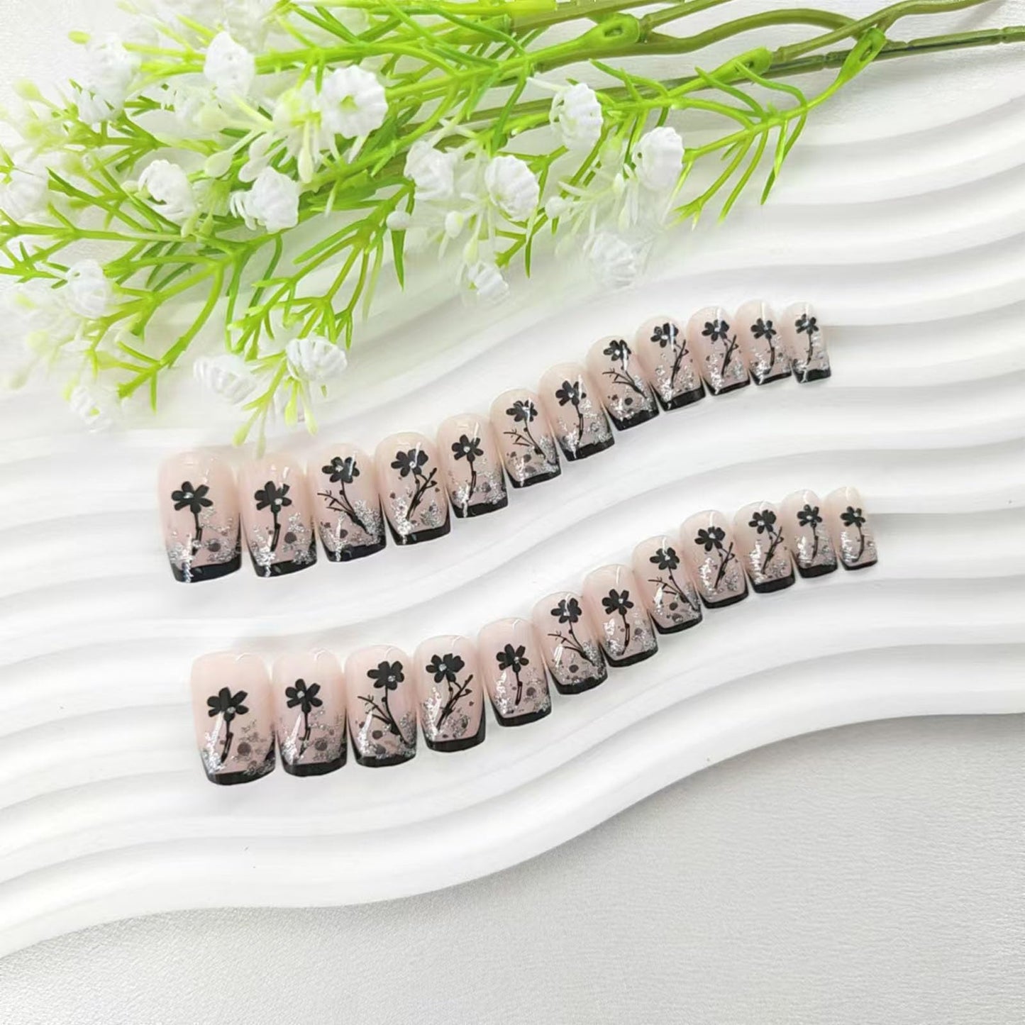 Medium Press on Nails Square Black French Tip Nails Press ons with Silver Glitter Design Black Flower Glue on Nails Acrylic Full Cover Fake Nails Glossy Artificial False Nails for Women 24Pcs