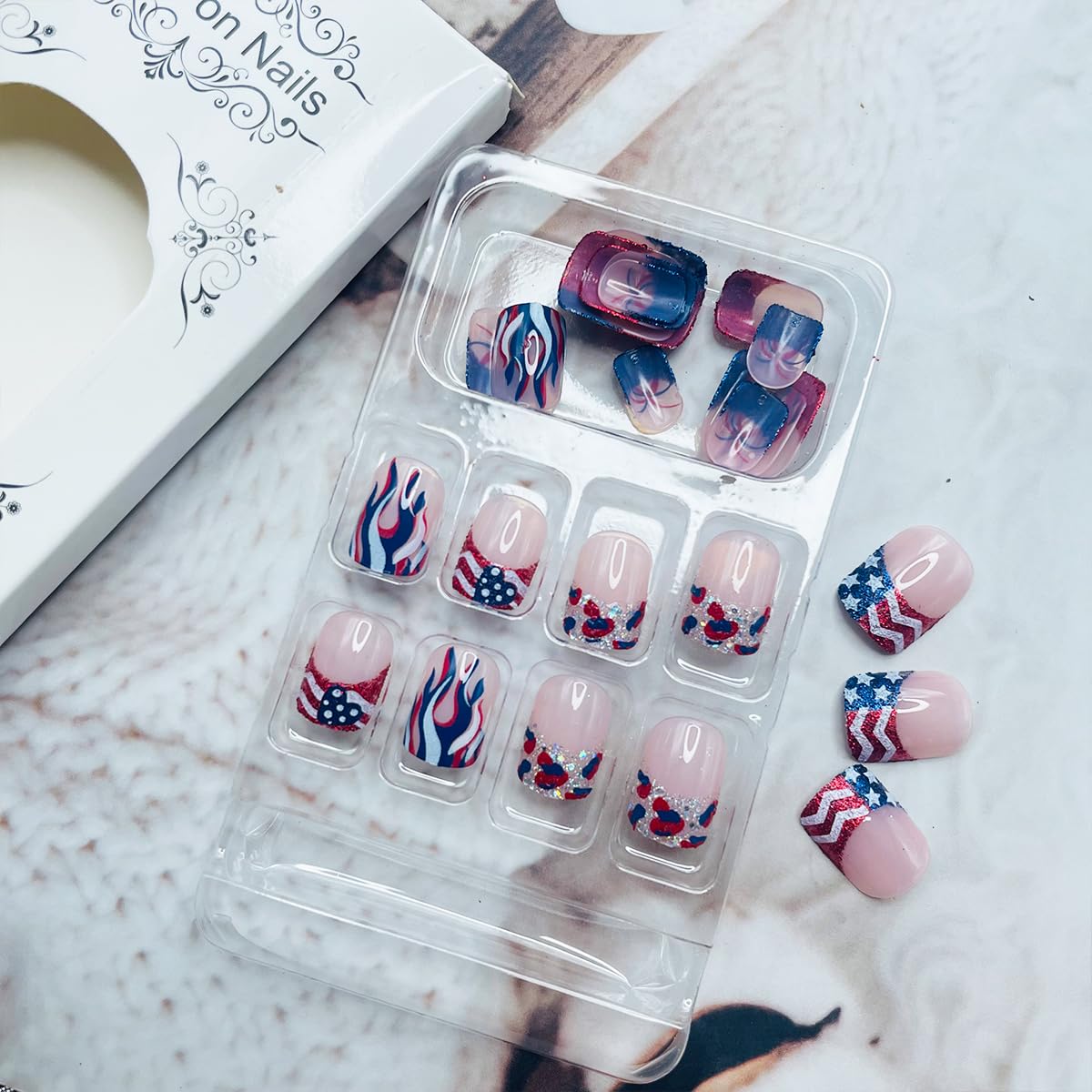 24Pcs 4th of July Press on Nails Short Square French Tip Fake Nails with Designs Glitter Heart Flame Firework Nails Tip False Nails Artificial Glue on Nails for Women DIY Independence Day Nails