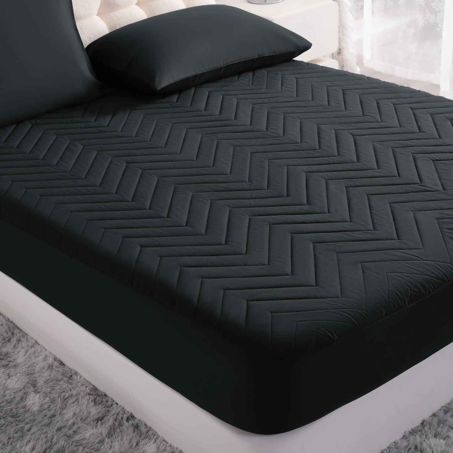 NTBAY Waterproof Mattress Protector, Quilted Twin Fitted Mattress Cover with 15" Deep Pocket- Machine Washable - Soft Mattress Pad Cover, Black