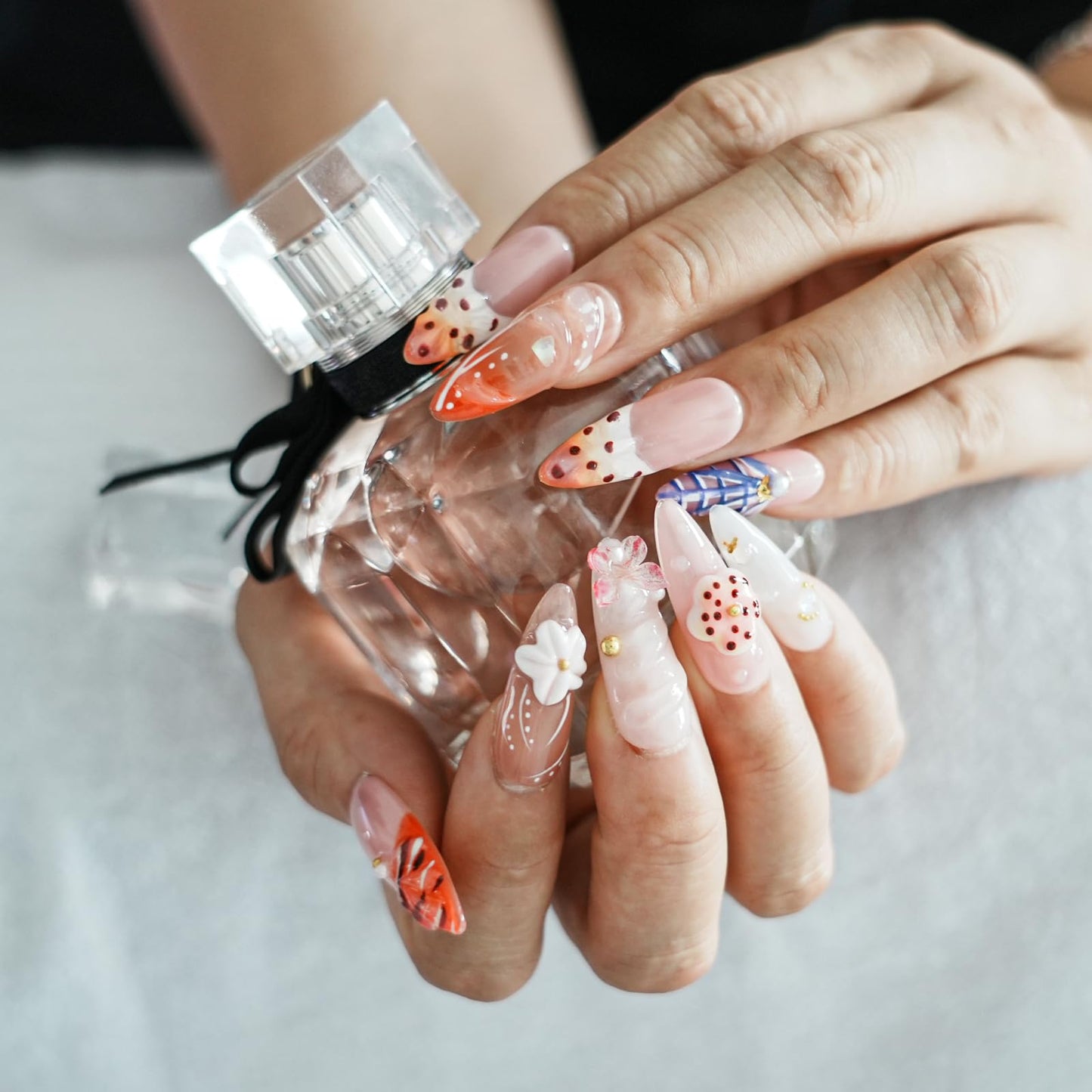 Tesytto Tropical Flower Press On Nails Long Almond, 3D Floral French Tip with Butterfly Design, Glossy Summer Fake Nails, Reusable Full Cover Acrylic Nails for Women (Tropical Flair,M)