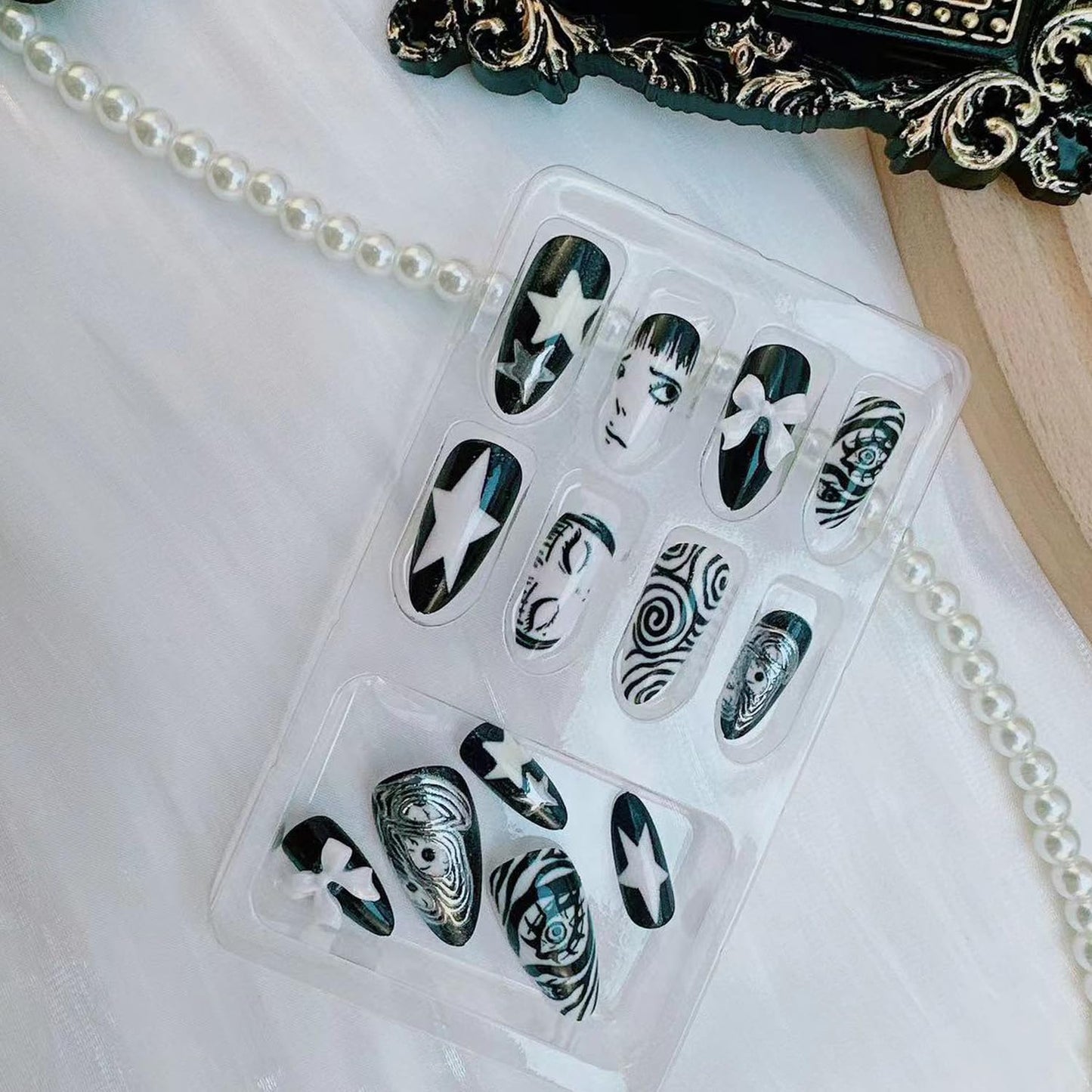 Gothic Press on Nails Medium Almond -Horror Black White False Nails with Eye Swirl 3D Bow Star Hand Painted, Spooky Punk Cartoon Anime Y2k Fake Nails with Glue Tabs for Women Halloween Cosplay 24Pcs