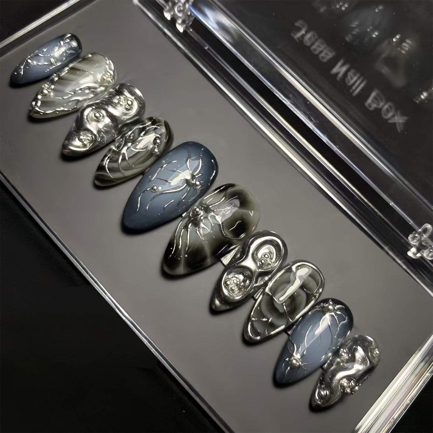 24Pcs Black Press on Nails Medium Almond Handmade Fake Nails with 3D Irregular Chrome Y2k Design Gothic False Nails Pearl Gems Full Cover Artificial Glue on Nails Cute Stick on Nails for Women DIY Set