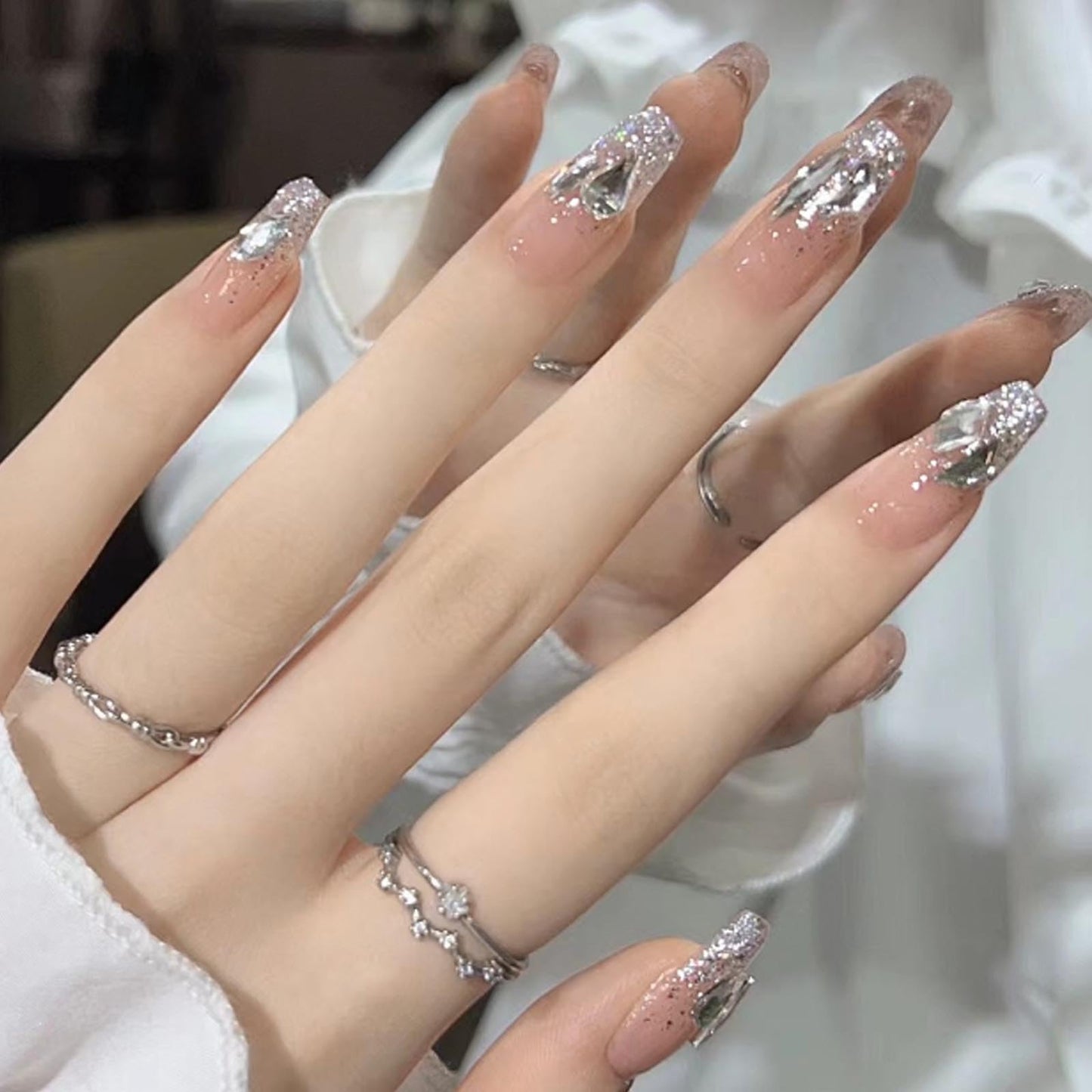 Hkanlre Rhinestones Press on Nails Nude Long Fake Nails Tips Full Cover Coffin False Nails for Women and Girls 24PCS