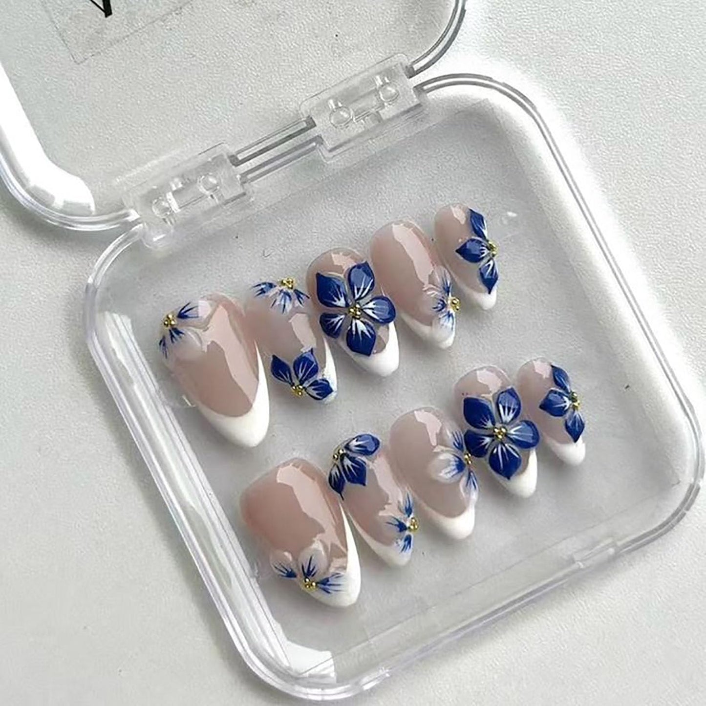 24Pcs Blue Flower Press on Nails Medium Almond Fake Nails with 3D Gold Rhinestones Designs White French Tip Stick on Nails Spring False Nails Glossy Glue on Nails for Women Acrylic Artificial Manicure