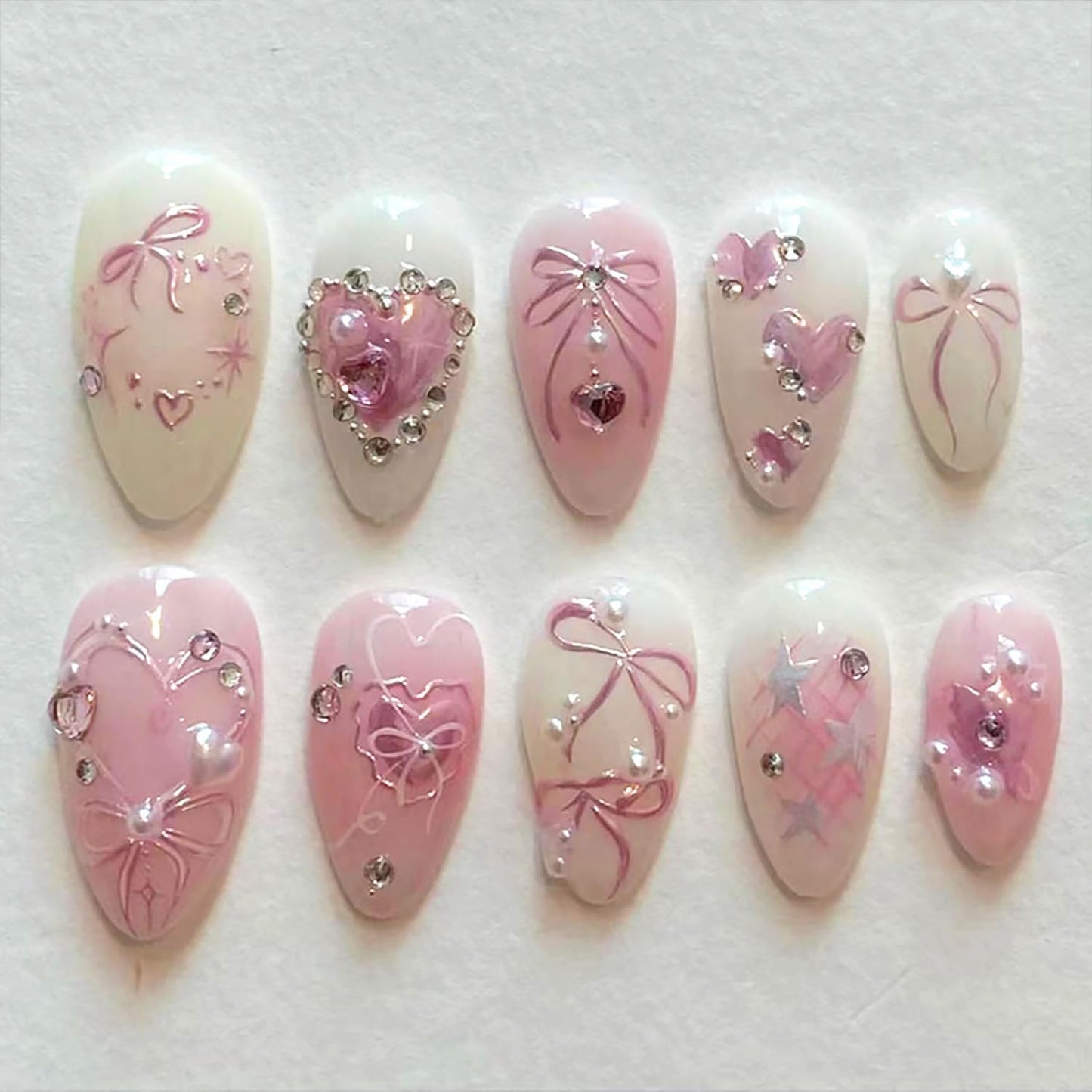 WBRRFJJ 24Pcs Pink Bow Press on Nails Medium Almond Acrylic False Nails with Silver Heart Rhinestones Design Glitter Full Cover Artificial Glue on Nails Handmade Stick on Nails for Women