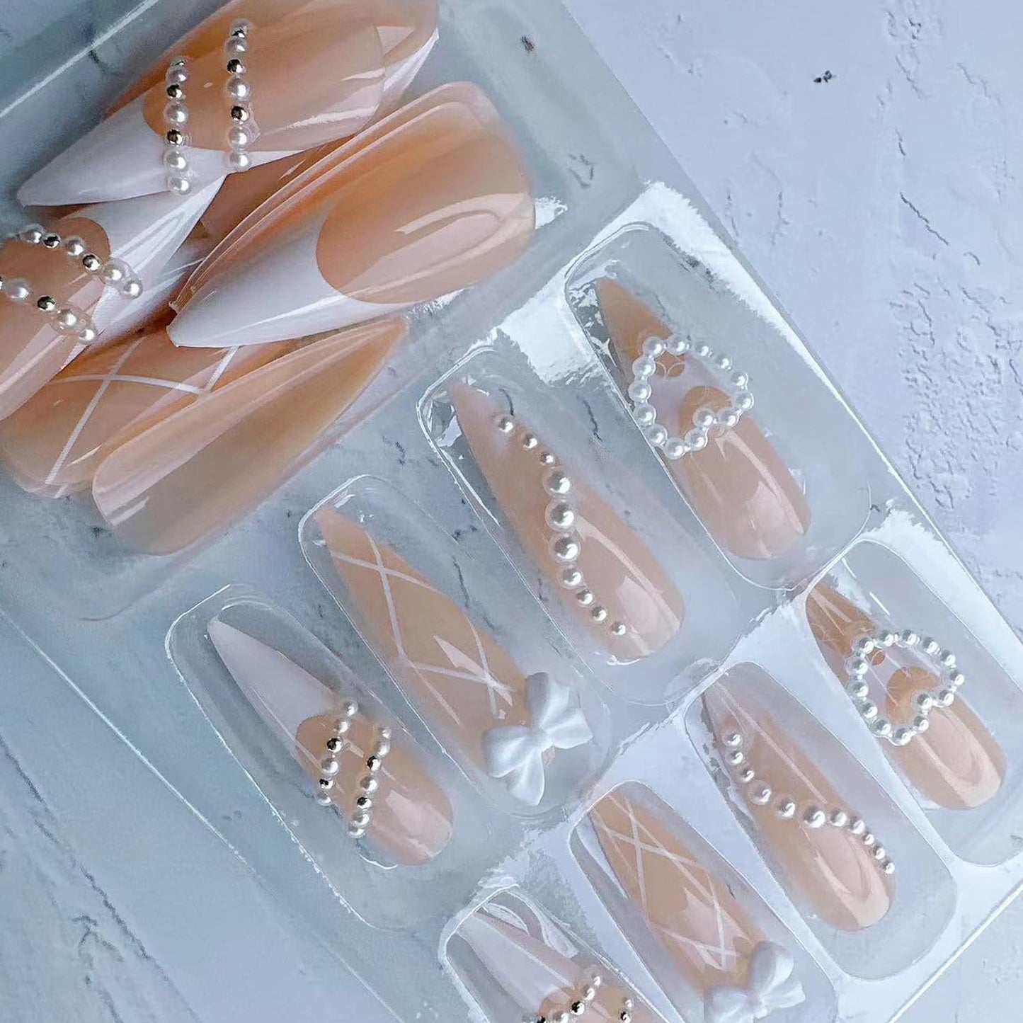 French Tip Press on Nails Long Almond Fake Nails with Heart-Shaped Pearl Bow Charms Acrylic Nails Press ons Cute Design French Nails Press ons Cute Bow Stick on Nails Rhinestones Nails for Women