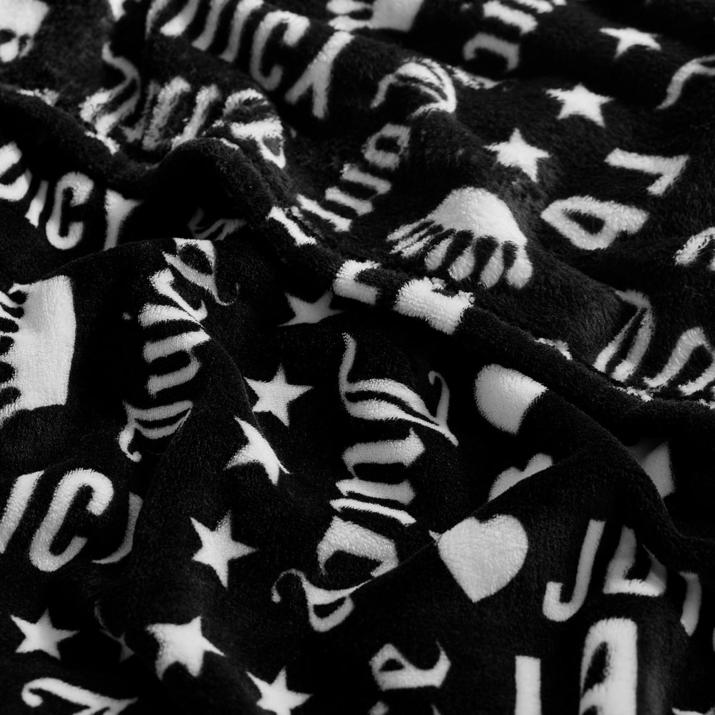 Juicy Couture - Throw Blanket | Crown Royal | Plush and Cozy | Decorative Blankets for Sofas, Chairs and Beds| Luxurious and Soft | Chic Home Decor | Measures 50" x 70" | Black/White