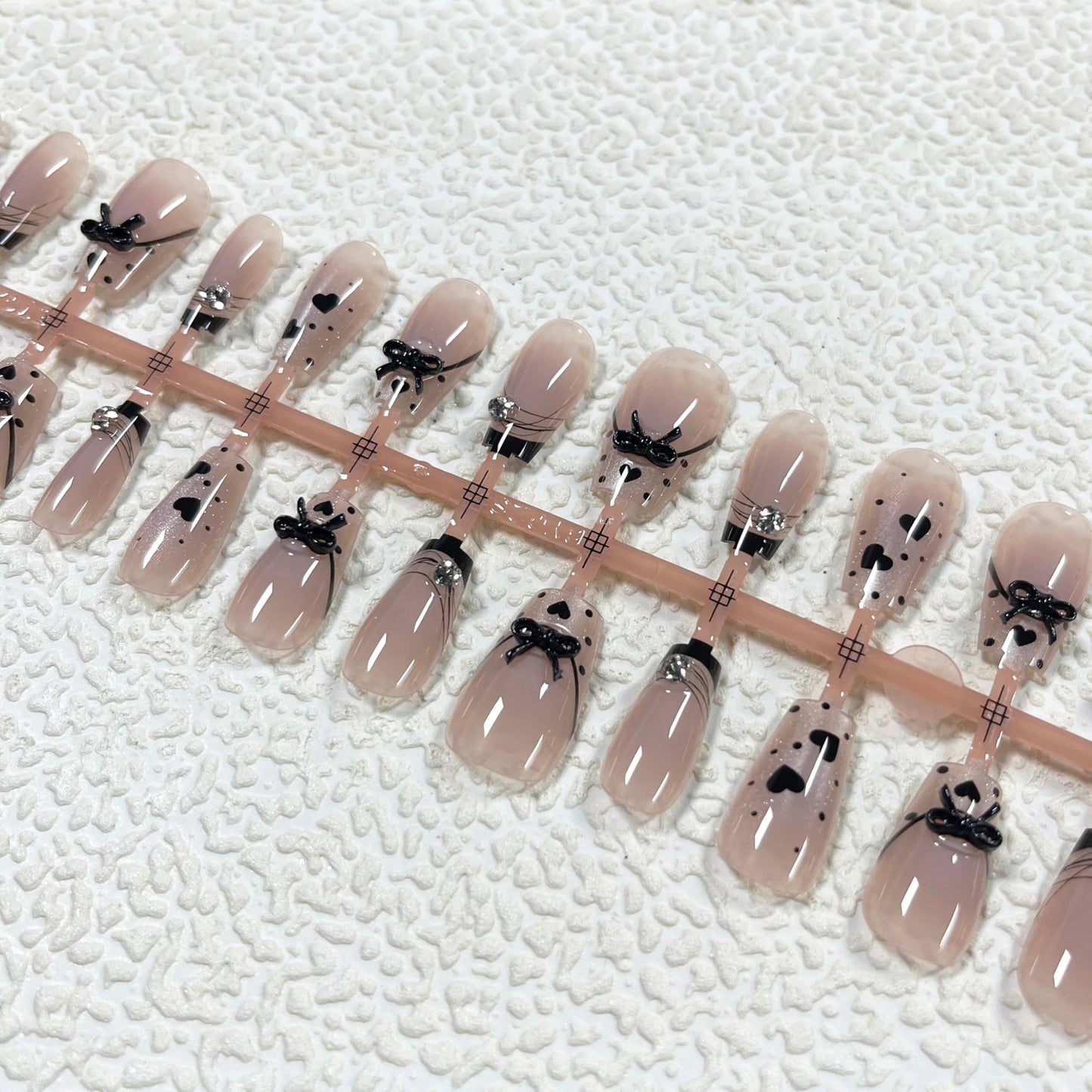 MERVF Press on Nails Medium Coffin, Black Heart French Tip Fake Nails Cat Eye Glitter Design Glue ons 3D Bow Rhinestones Acrylic Nail Glossy 30pcs