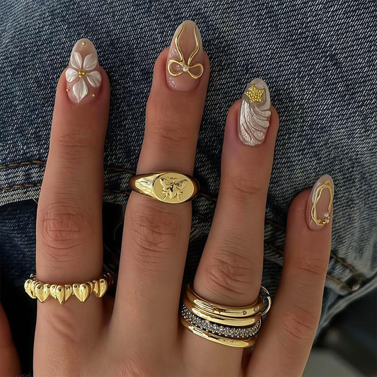 RUOKEXIN Almond Press on Nails Medium Fake Nails Nude False Nails with 3D Gold Bow Designs Full Cover Nail Press ons Sparkly Artificial Nails for Women 24Pcs