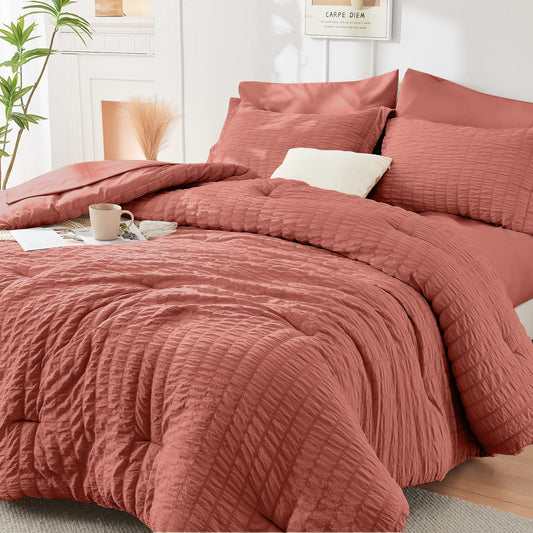 HYMOKEGE Coral Oversized Queen Comforter Set Seersucker 7 Pieces, All Season Luxury Bed in a Bag for Bedroom, Bedding Set with Comforter, Sheets, Pillowcases & Shams