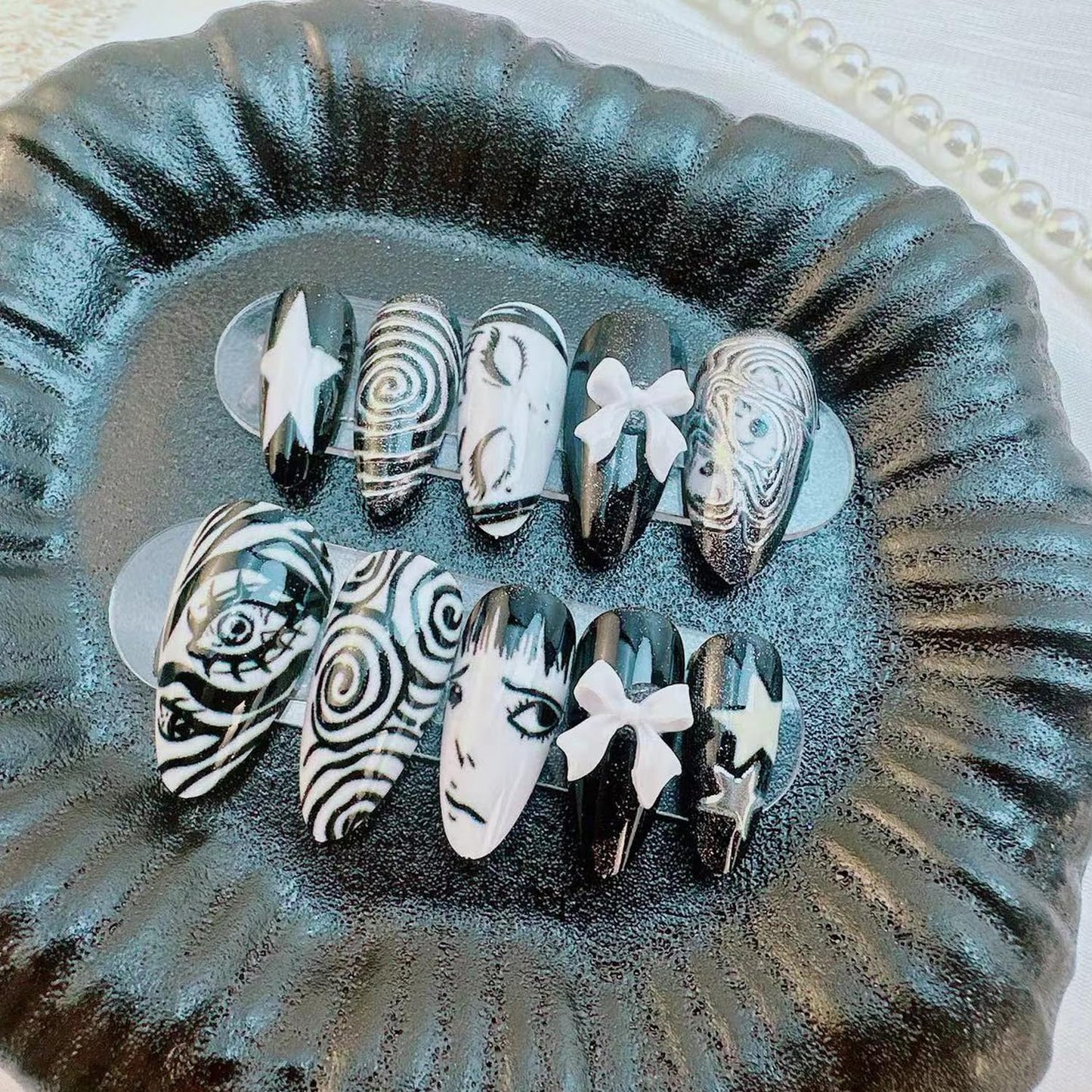 Gothic Press on Nails Medium Almond -Horror Black White False Nails with Eye Swirl 3D Bow Star Hand Painted, Spooky Punk Cartoon Anime Y2k Fake Nails with Glue Tabs for Women Halloween Cosplay 24Pcs
